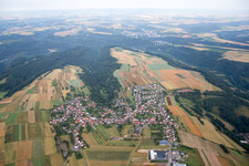 Village - view on the edge of agricultural fields and farmland in Donsieders in the state Rhineland-Palatinate