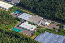 Aerial photograpy of Industrial area Am Sauerbrunnen with Markengetränke Schwollen GmbH and Hochwald Sprudel Schupp GmbH in Schwollen in the state Rhineland-Palatinate, Germany