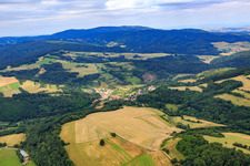 Village view from the southwest In the background the Donnersberg in Schweisweiler in the state Rhineland-Palatinate, Germany