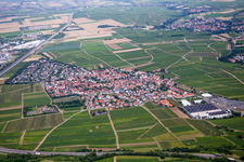 Aerial view of Village - view on the edge of agricultural fields and farmland in Tiefenthal in the state Rhineland-Palatinate, Germany