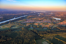 Aerial view of Rhine and village view in the morning from the north in Neuburg am Rhein in the state Rhineland-Palatinate, Germany