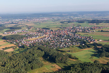 Village - view on the edge of agricultural fields and farmland in Langensendelbach in the state Bavaria, Germany