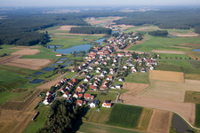 Village on the lake bank areas of the village in the district Untermembach in Hessdorf in the state Bavaria, Germany