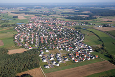 Village - view on the edge of agricultural fields and farmland in Grossenseebach in the state Bavaria, Germany