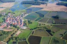 Shore areas of the ponds for carp fish farming in Oberlindach near Erlangen in Weisendorf in the state Bavaria