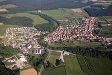 Village - view on the edge of agricultural fields and farmland in Herbsheim in Grand Est, France