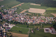 Oblique view of Village - view on the edge of agricultural fields and farmland in Herbsheim in Grand Est, France