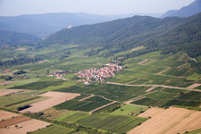 Village - view on the edge of agricultural fields and farmland in Dieffenthal in Grand Est, France