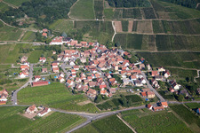 Aerial photograpy of Village - view on the edge of agricultural fields and farmland in Dieffenthal in Grand Est, France