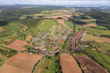 Village - view on the edge of agricultural fields and farmland in Schuetzingen in the state Baden-Wurttemberg, Germany