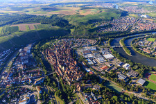 Aerial view of Historic old town above the Enz River with Waldhorn Tower, city wall, registry office, castle courtyard, tower, city church, and Friedrich Schelling School Besigheim in Besigheim in the state Baden-Wuerttemberg, Germany