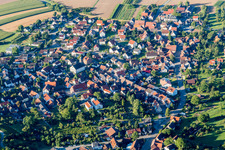 Aerial view of Village - view on the edge of agricultural fields and farmland in Winzerhausen in the state Baden-Wurttemberg, Germany