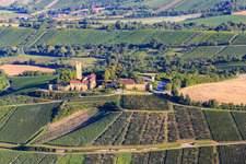 Aerial view of Ravensburg Castle (Sulzfeld) in the morning on a hill with vineyards in Sulzfeld in the state Baden-Wuerttemberg, Germany