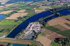 Gravel plant of Heidelberg Materials Mineralik on the Old Rhine and Polder Neupotz in Neupotz in the state Rhineland-Palatinate, Germany