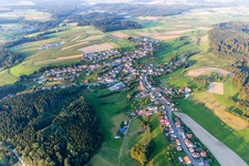Village - view on the edge of agricultural fields and farmland in Zoznegg in the state Baden-Wurttemberg, Germany