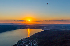 Sunset with paraglider over the countryside near Sipplingen/Bodensee in Bodman-Ludwigshafen in the state Baden-Wurttemberg