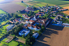Aerial photograpy of Monastery and monastery church Sießen with vegetable garden, café in the monastery courtyard and parish church of St. Markus in the district Sießen in Bad Saulgau in the state Baden-Wuerttemberg, Germany