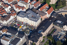 Sale and food stands and trade stalls in the market place on weekly market on Leopoldplatz in Sigmaringen in the state Baden-Wurttemberg, Germany