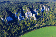 Rocks on the steep bank of the curved course of the Danube in the district Neidingen in Beuron in the state Baden-Wuerttemberg, Germany