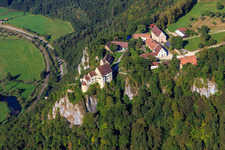 Oblique view of Werenwag Castle (Langenbrunn) at the Schreyfels climbing rock above the Danube in the district Hausen im Tal in Beuron in the state Baden-Wuerttemberg, Germany