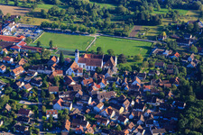 Municipal administration Öhningen, Church of St. Hippolyt and Verena in front of the sports field at the school with secondary school in the district Stiegen in Öhningen in the state Baden-Wuerttemberg, Germany