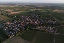 Aerial view of Village - view on the edge of agricultural fields and farmland in Impflingen in the state Rhineland-Palatinate, Germany
