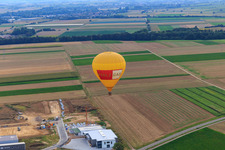 Hot air balloon PFALZGAS over the W II industrial park in Herxheim bei Landau in the state Rhineland-Palatinate, Germany