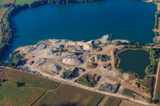 Quarry lake and company premises of Pfadt GmbH Kieswerk-Baustoffe in Leimersheim in the state Rhineland-Palatinate, Germany