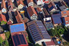 Barns with PV roofs on Rheinstr in Kandel in the state Rhineland-Palatinate, Germany from the plane