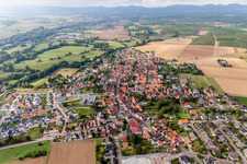 Oblique view of Village - view on the edge of agricultural fields and farmland in Rohrbach in the state Rhineland-Palatinate, Germany