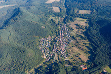 Aerial view of Village - view on the edge of agricultural fields and farmland in Birkenhoerdt in the state Rhineland-Palatinate, Germany
