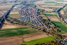 Village - view on the edge of agricultural fields and farmland in Studernheim in the state Rhineland-Palatinate, Germany