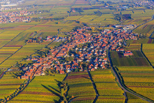 Wine-growing village between autumn-colored vineyards from the west in Rhodt unter Rietburg in the state Rhineland-Palatinate, Germany
