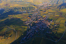 Aerial view of Wine-growing village on the edge of the Haardt in autumn colours from the west in Birkweiler in the state Rhineland-Palatinate, Germany