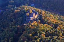 Castle ruins of Landeck Castle in the autumn forest at evening light in Klingenmünster in the state Rhineland-Palatinate, Germany