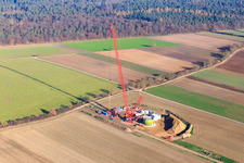 Construction site wind turbine foundation with crane in Hatzenbühl in the state Rhineland-Palatinate, Germany
