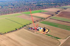 Aerial view of Construction site wind turbine foundation with crane in Hatzenbühl in the state Rhineland-Palatinate, Germany