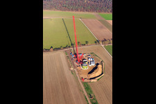 Construction site wind turbine foundation with crane in Hatzenbühl in the state Rhineland-Palatinate, Germany from above