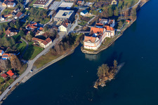 Castle Neuhaus am Inn with secondary school Maria Ward Neuhaus on an island in the Inn in Neuhaus am Inn in the state Bavaria, Germany seen from above