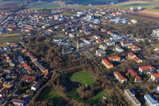 Rathausstraße with modern architecture of the parish church Heilig Geist and city park from the southeast in Bad Füssing in the state Bavaria, Germany