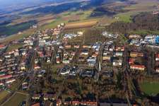 Rathausstraße with modern architecture of the parish church Heilig Geist from the south in Bad Füssing in the state Bavaria, Germany