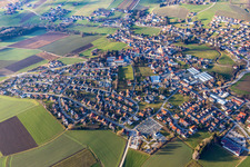 Aerial view of Village - view on the edge of agricultural fields and farmland in Triftern in the state Bavaria, Germany