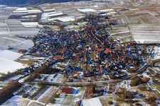 Village overview in winter with snow from the east in Göcklingen in the state Rhineland-Palatinate, Germany