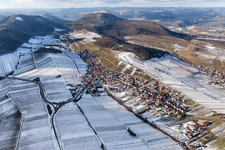 Wintry snowy Village - view on the edge of snowed wine yards in Ranschbach in the state Rhineland-Palatinate, Germany