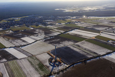 Aerial photograpy of The first wind turbine of the Hatzenbühler wind farm in winter with snow in Hatzenbühl in the state Rhineland-Palatinate, Germany