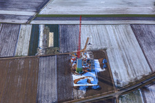 Aerial photograpy of Mast assembly at a wind turbine of the Hatzenbühler wind farm in winter with snow in Hatzenbühl in the state Rhineland-Palatinate, Germany