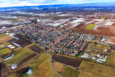 Village overview in winter with little snow from the southeast in Minfeld in the state Rhineland-Palatinate, Germany