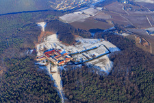 Aerial view of Horse boarding at Liebfrauenberg Monastery in winter with snow in Bad Bergzabern in the state Rhineland-Palatinate, Germany