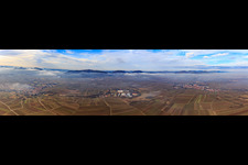 Panorama of the Haardt from Göcklingen to Landau in winter with low clouds in Ilbesheim bei Landau in the state Rhineland-Palatinate, Germany