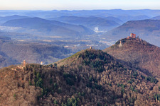 The four castle ruins Scharfenberg, Jungturm, Anebos and Trifels Castle in winter from the southeast in Leinsweiler in the state Rhineland-Palatinate, Germany